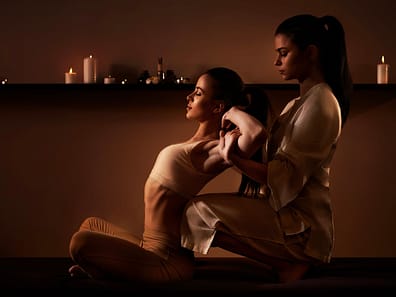 Traditional Thai massage stretching session.