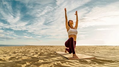 Outdoor beach Hatha yoga practice.