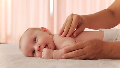 Gentle child infant massage therapy.